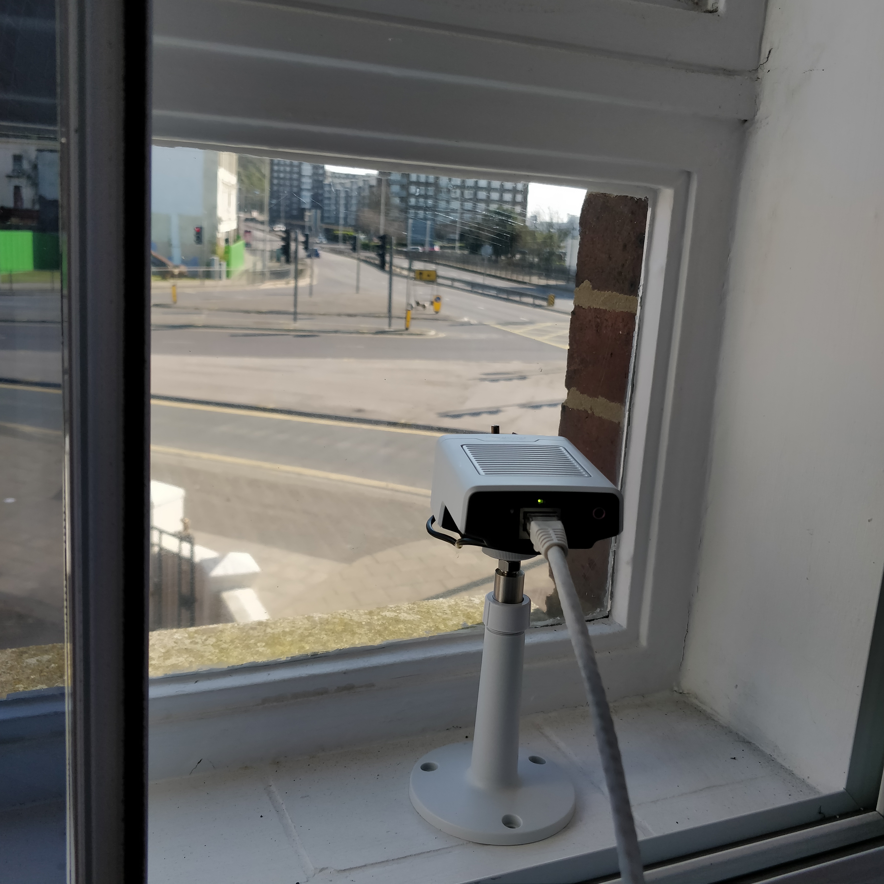 Axis M1135 IP camera looking through our window 2-4-20.jpg